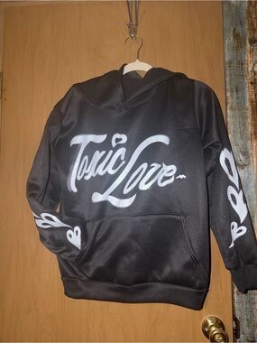 Black Hoodie with White 'Toxic Love' Script